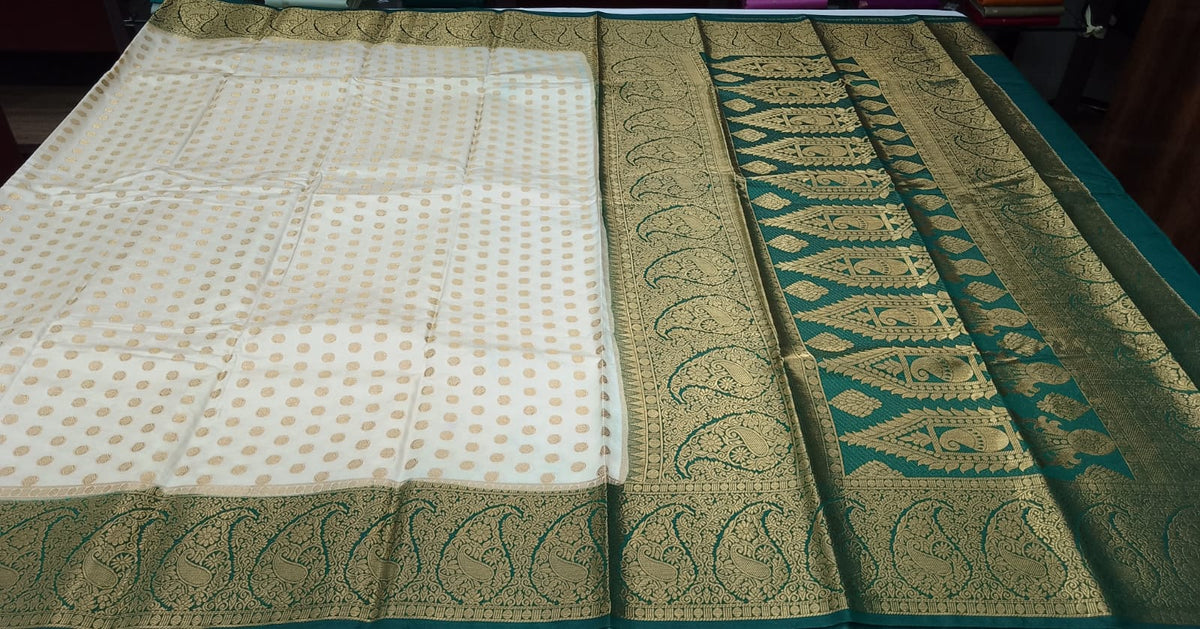 Semi Silk Butta Saree – Ivory Cream with Emerald Green Rich Zari Border & Grand Pallu