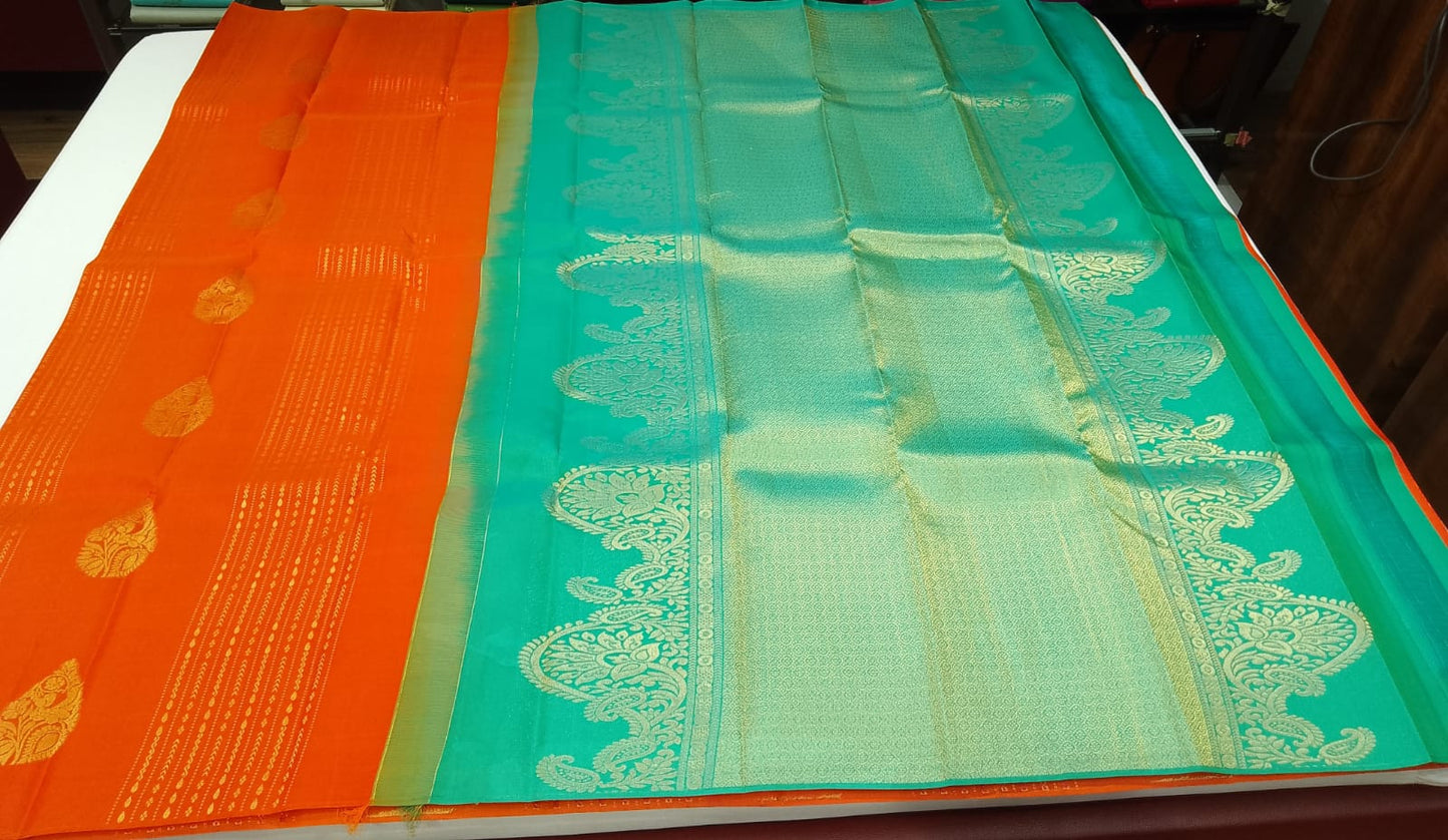 Kanjivaram Borderless Saree – Sunset Orange & Aqua Green with Rich Zari