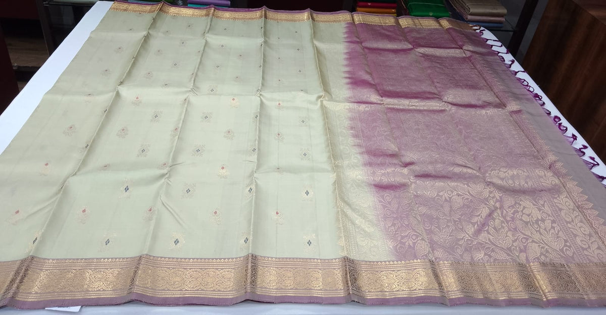 Pure Handloom Kanjivaram Silk Saree in Muted Sage Green with Onion Plum Zari Border