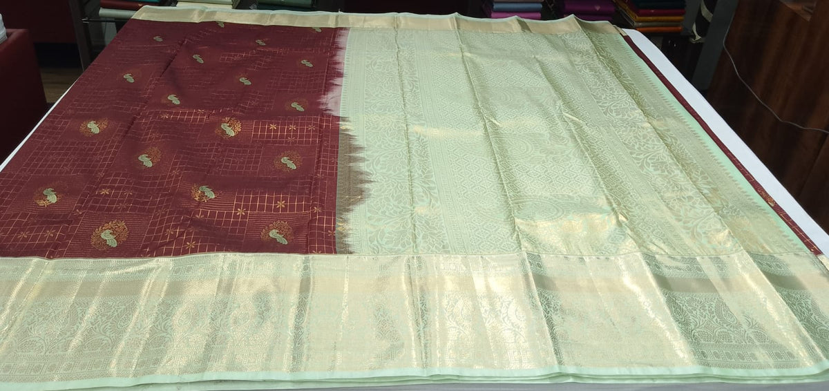 Kanjivaram Bridal Saree –Deep Maroon with Mint Green Rich Zari Border & Grand Pallu