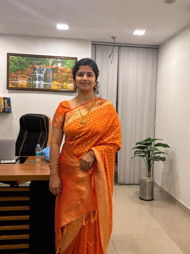 Khushi Reddy, Founder of Kunjaree Silks, in a handwoven silk saree at the Bengaluru store