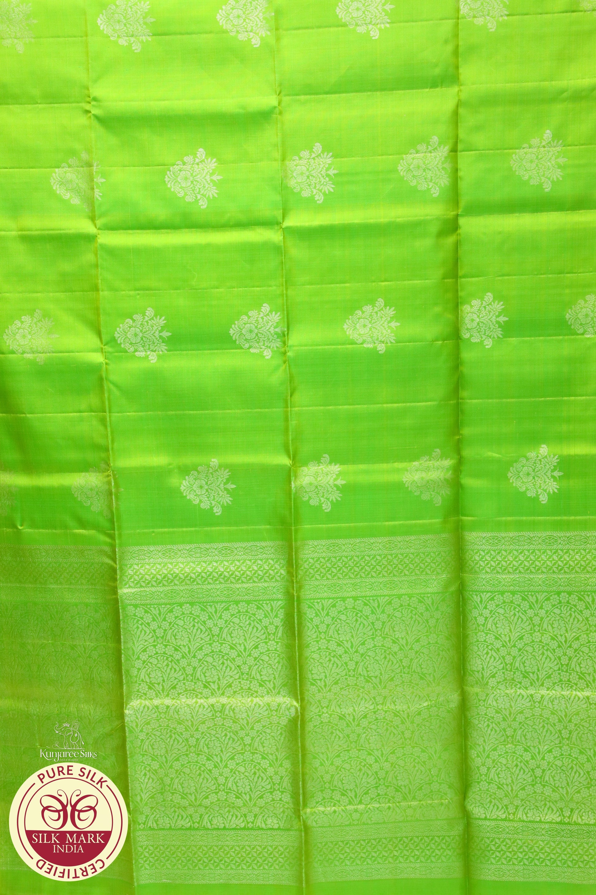 Green with silver self boarder pure silk Saree