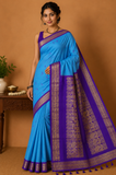 Kalyani Cotton Saree in Sky Blue with Royal Purple Zari Border & Rich Pallu