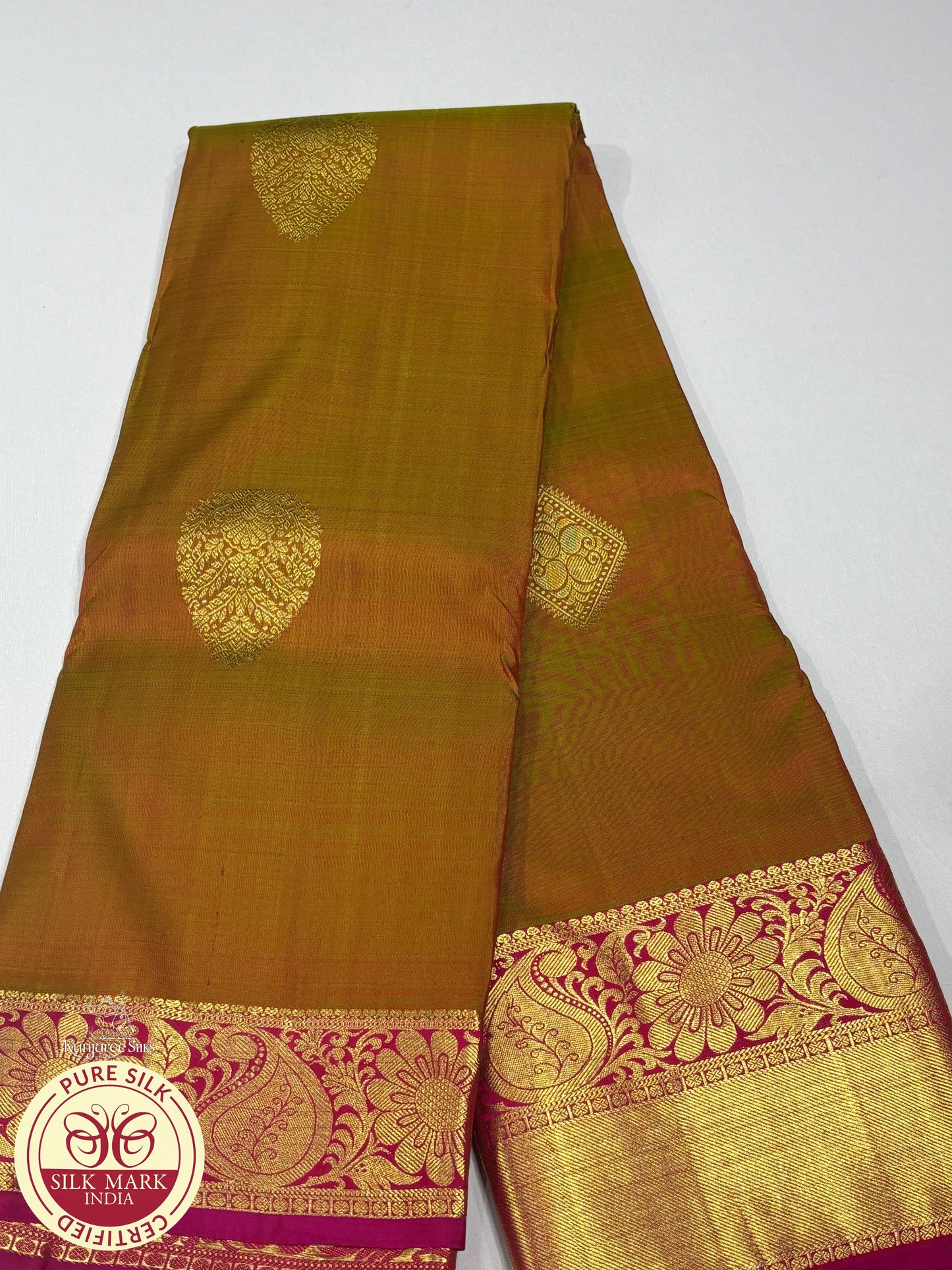 Kanjivaram Dual Tone Saree – Olive Gold Body with Rani Pink Rich Zari Pallu