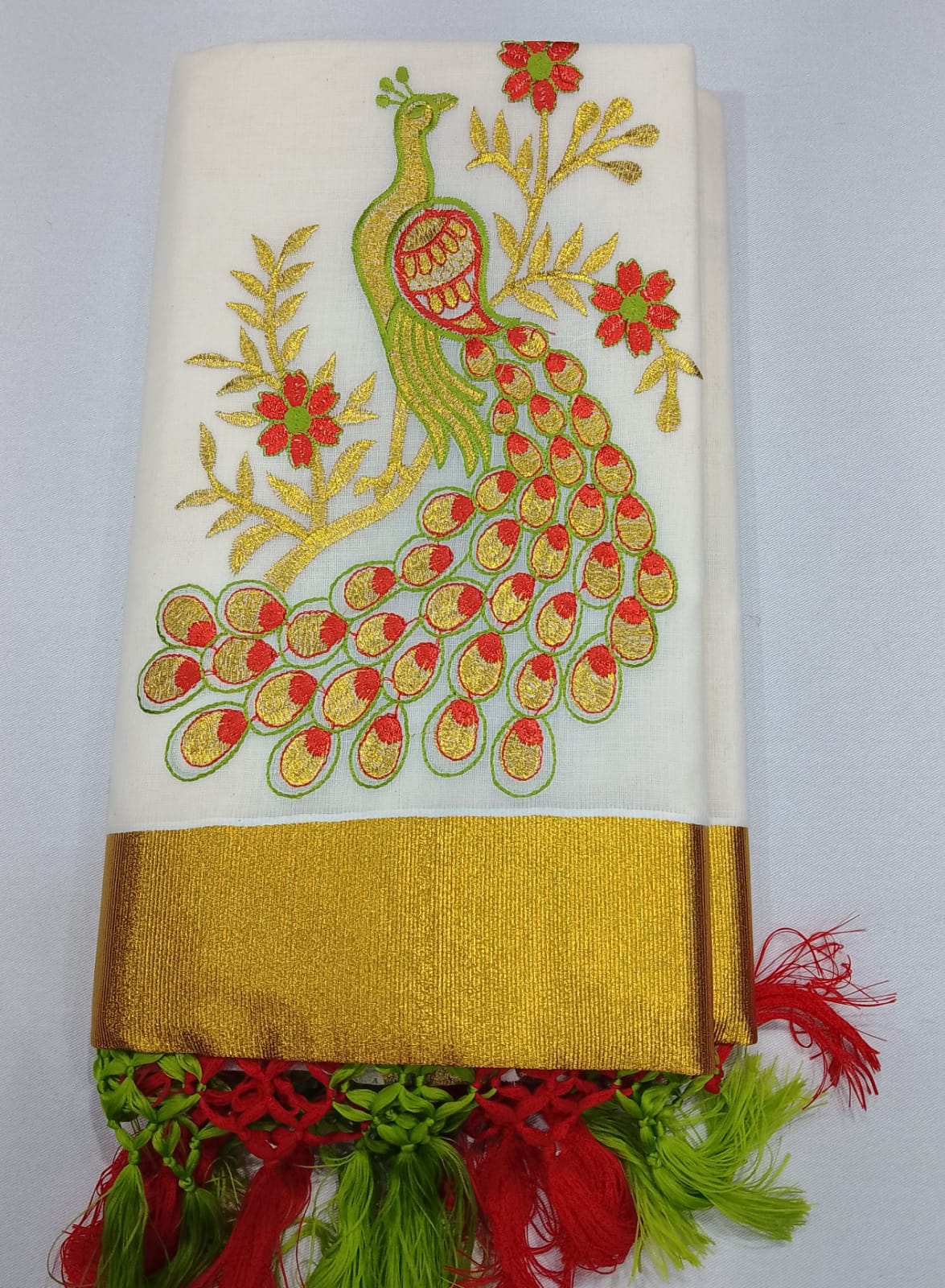 Elegant Kerala Cotton Saree with Peacock Motif & Golden Kasavu Border