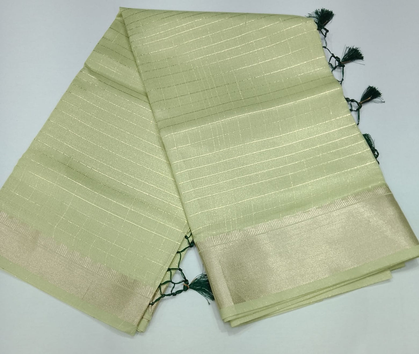 Elegant Pistachio Green Linen Saree with Golden Zari Border & Designer Blouse