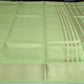 Elegant Pistachio Green Linen Saree with Golden Zari Border & Designer Blouse