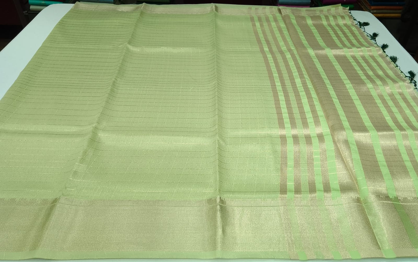 Elegant Pistachio Green Linen Saree with Golden Zari Border & Designer Blouse