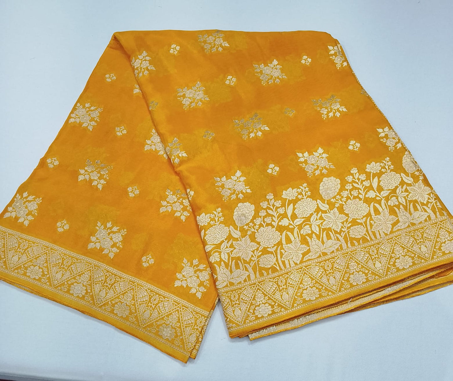Radiant Mustard Yellow Banarasi Crepe Saree with Antique Silver Floral Zari Border