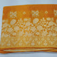 Radiant Mustard Yellow Banarasi Crepe Saree with Antique Silver Floral Zari Border