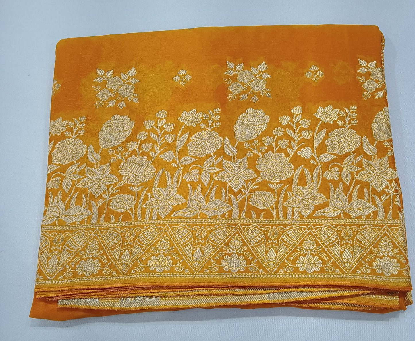Radiant Mustard Yellow Banarasi Crepe Saree with Antique Silver Floral Zari Border