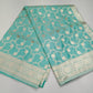 Aqua Blue Banarasi Mashroo Silk Saree with Silver Zari Floral Jaal & Rich Woven Pallu