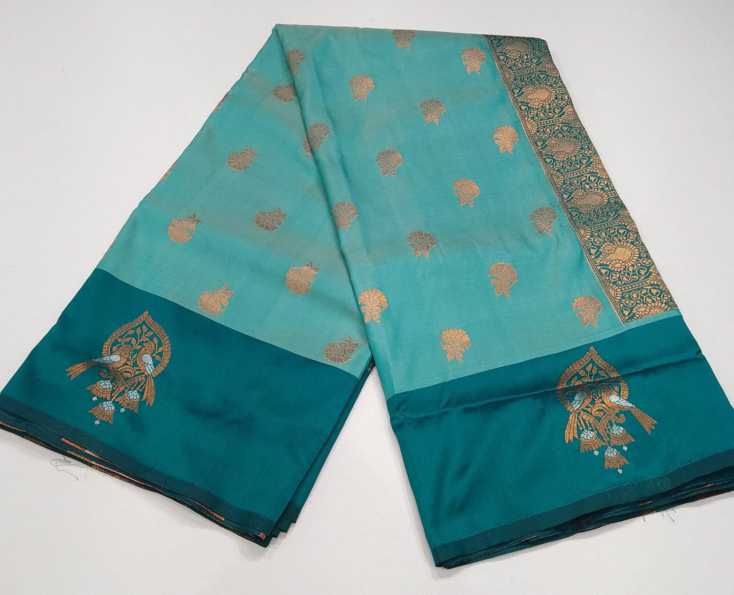 Graceful Aqua Blue Semi Soft Silk Meenakari Saree with Deep Teal Border & Rich Woven Pallu