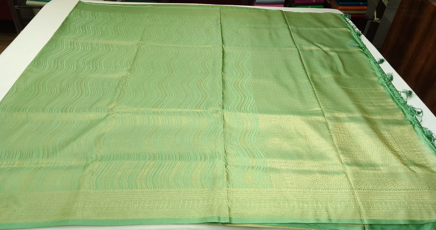 Designer Satin Silk Saree – Pista Green with Golden Wave Zari Weaving