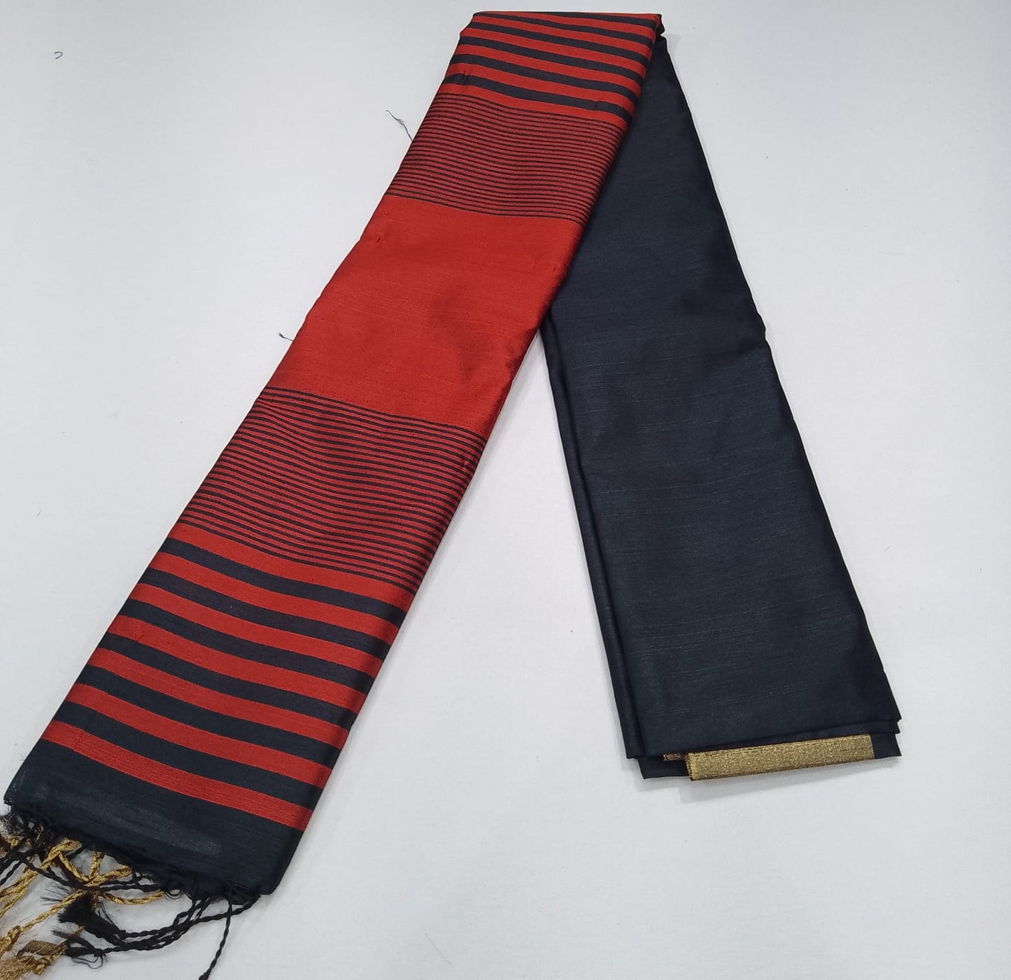 Premium Raw Silk Saree – Midnight Black with Vermilion Red Striped Pallu