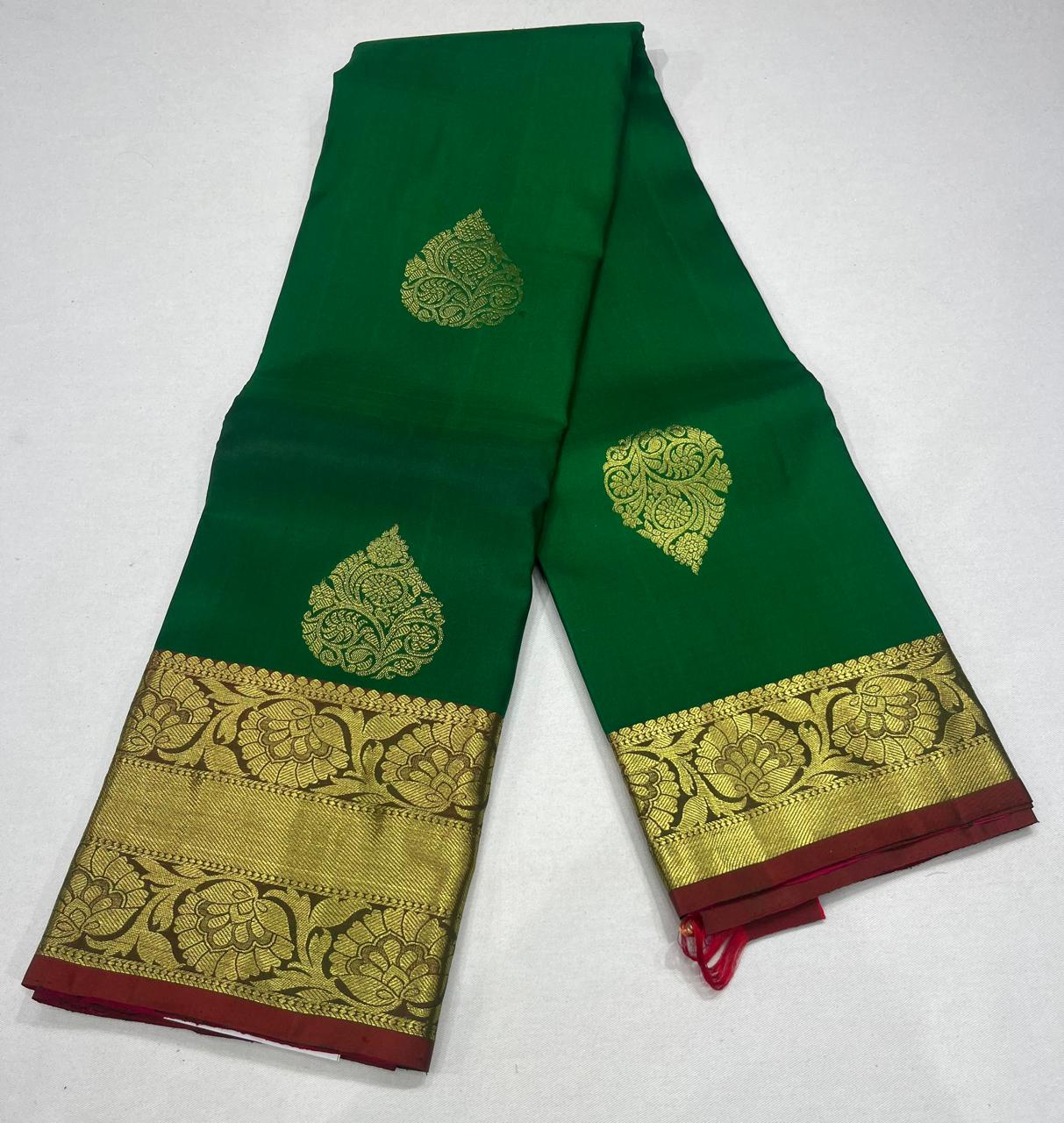 Kanjivaram Saree – Emerald Green & Rani Pink Dual Tone Elegance