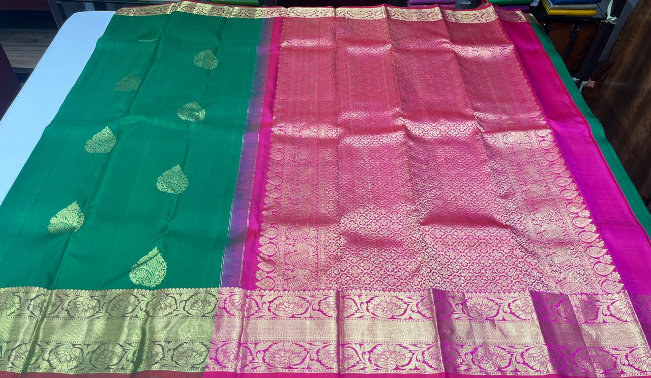 Kanjivaram Saree – Emerald Green & Rani Pink Dual Tone Elegance