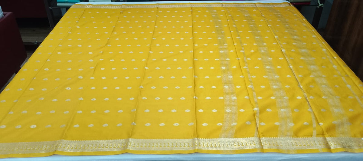 Radiant Lemon Yellow Semi Mysore Silk Saree with Silver Zari Buttas & Traditional Border