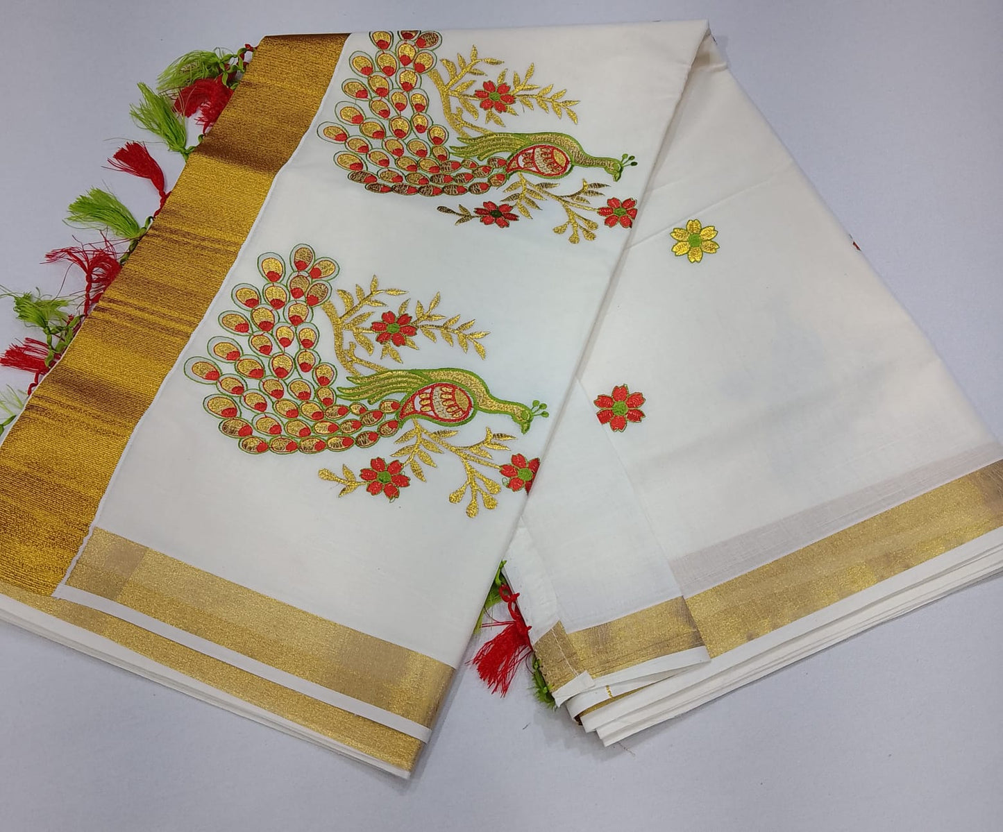 Elegant Kerala Cotton Saree with Peacock Motif & Golden Kasavu Border
