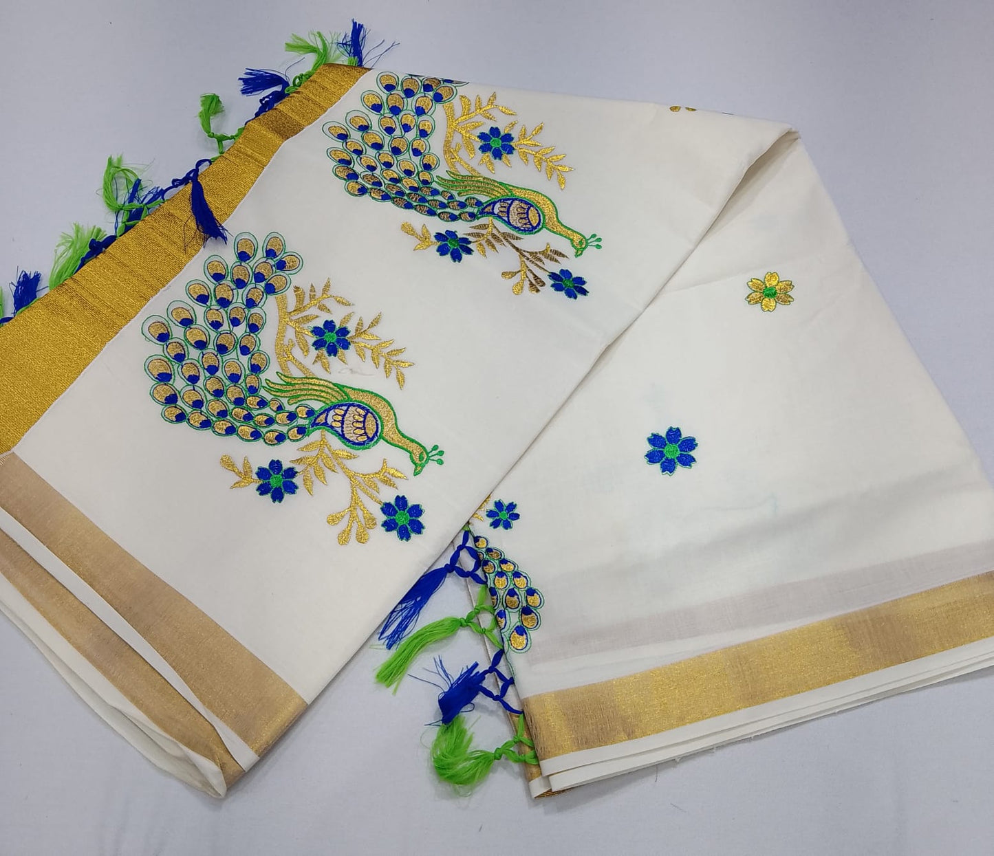 Elegant Kerala Cotton Saree with Royal Peacock Embroidery & Golden Kasavu Border