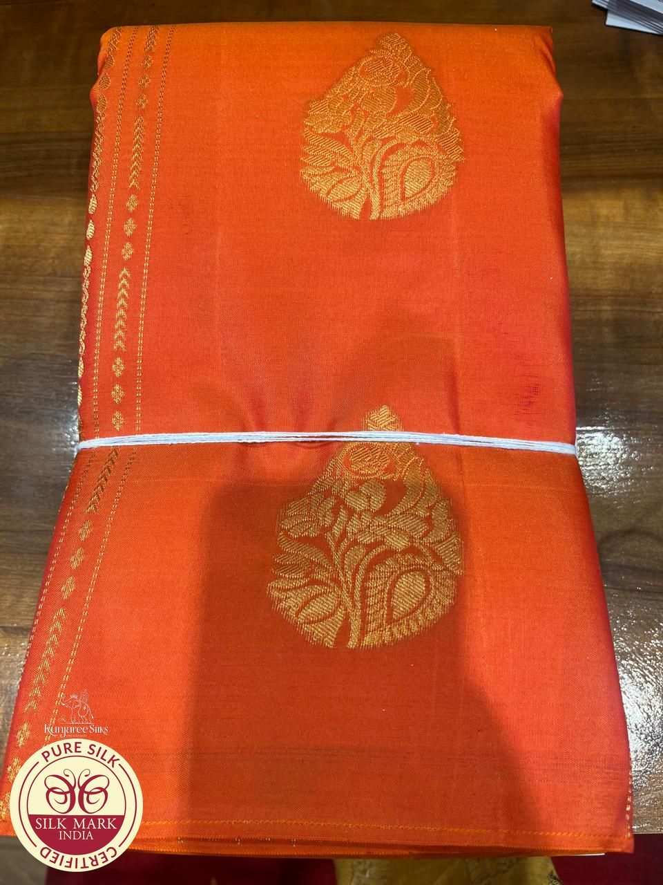 Kanjivaram Borderless Saree – Sunset Orange & Aqua Green with Rich Zari