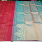 Kanjivaram Borderless Saree – Rani Pink & Aqua Blue with Elegant Zari