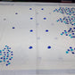 Elegant Off-White Kerala Cotton Saree with Blue Leaf Motif & Silver Kasavu Border