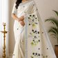 Off-White Kerala Cotton Saree with Black & Parrot Green Floral and Silver Kasavu Border