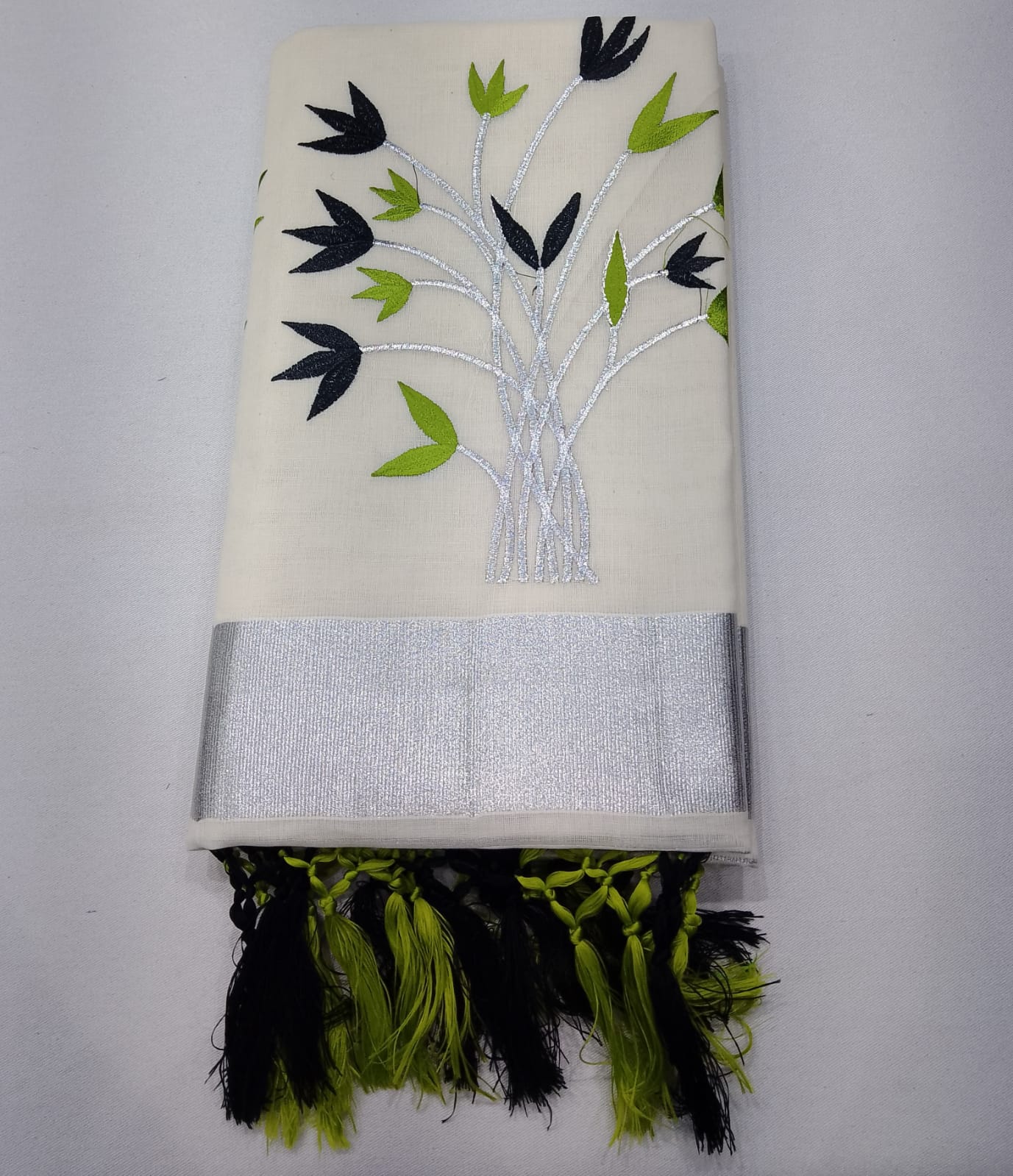 Off-White Kerala Cotton Saree with Black & Parrot Green Floral and Silver Kasavu Border