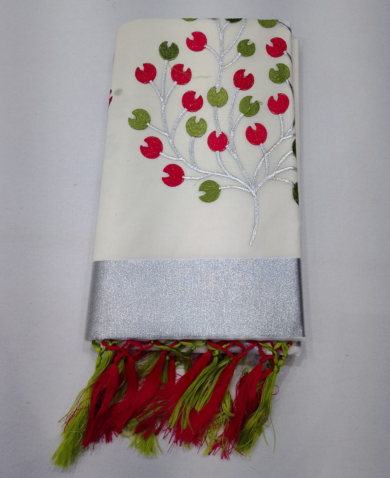 Off-White Kerala Cotton Saree with Pink & Olive Green Leaf Motifs and Silver Kasavu Border