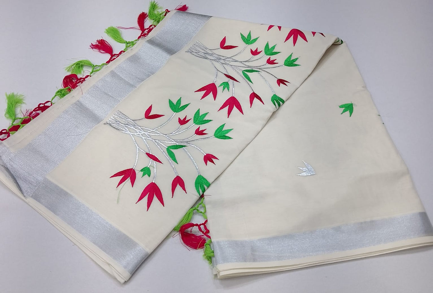 Off-White Kerala Cotton Saree with Red & Parrot Green Floral Vine Design and Silver Kasavu Border