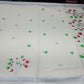 Off-White Kerala Cotton Saree with Red & Parrot Green Floral Vine Design and Silver Kasavu Border