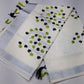 Off-White Kerala Cotton Saree with Black & Parrot Green Leaf Motifs and Silver Kasavu Border