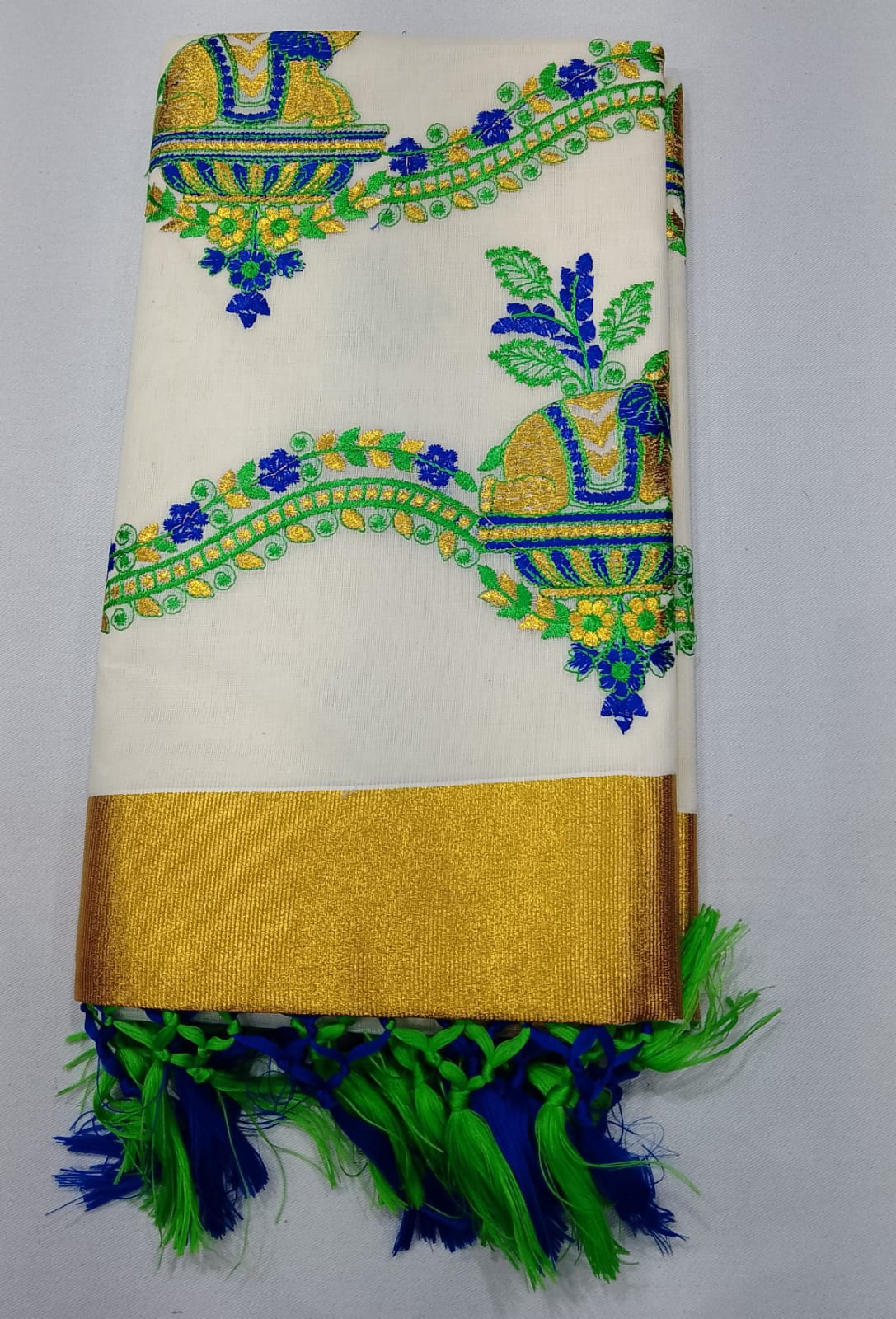 Off-White Kerala Cotton Saree with Traditional Elephant Pot Motif and Golden Kasavu Border