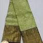 Pure Handloom Kanjivaram Silk Bridal Saree in Pastel Lime Green with Antique Gold Elephant Border & Navy Blue Zari Pallu
