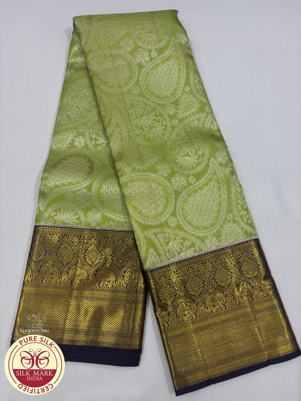 Pure Handloom Kanjivaram Silk Bridal Saree in Pastel Lime Green with Antique Gold Elephant Border & Navy Blue Zari Pallu