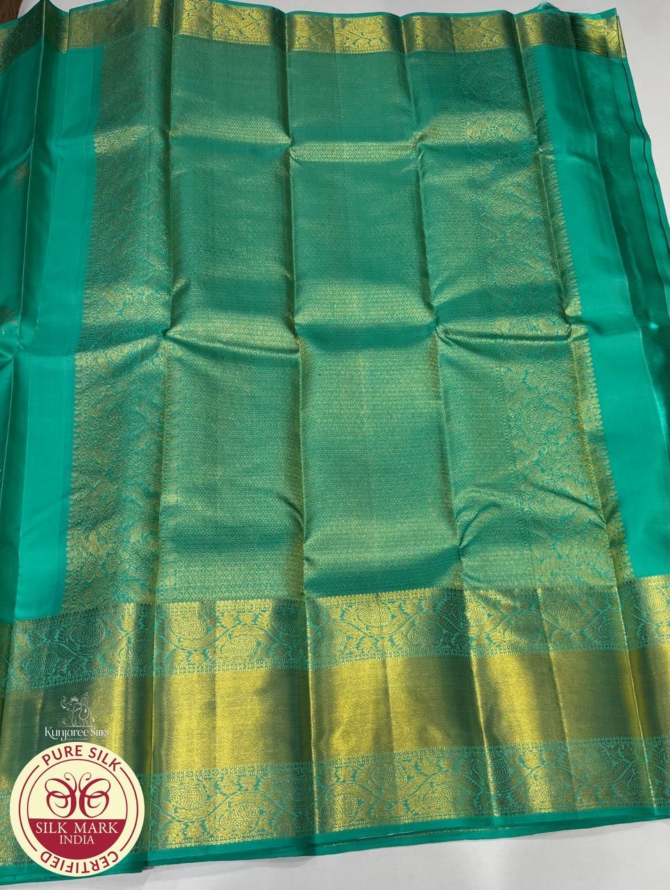 Pure Handloom Kanjivaram Silk Saree – Peacock Teal Blue with Antique Gold Zari