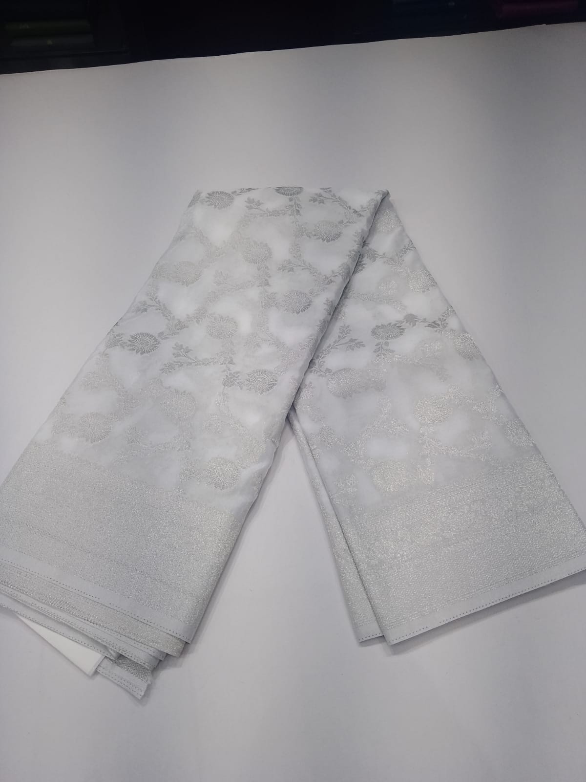 Pearl White Silver Zari Floral Georgette Chinnon Saree