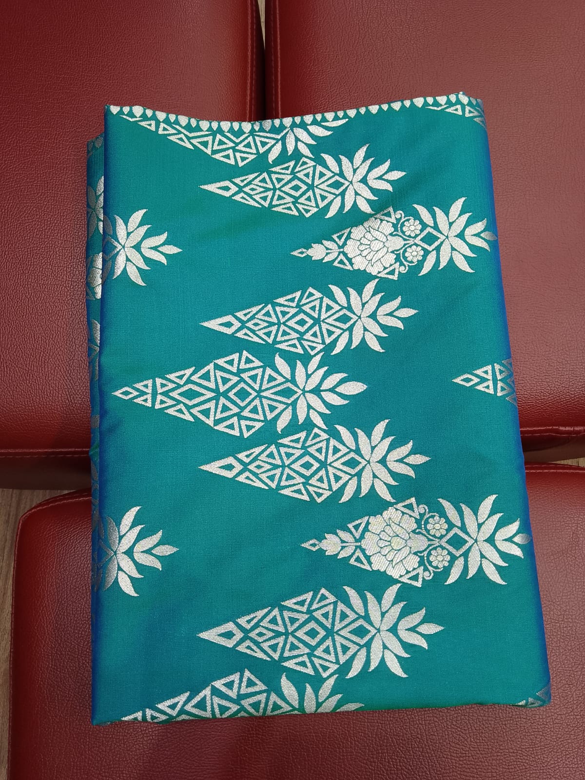 Teal Blue Banarasi Katan Semi Silk Saree with Silver Zari Floral & Paisley Weaves