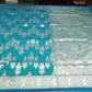 Teal Blue Banarasi Katan Semi Silk Saree with Silver Zari Floral & Paisley Weaves