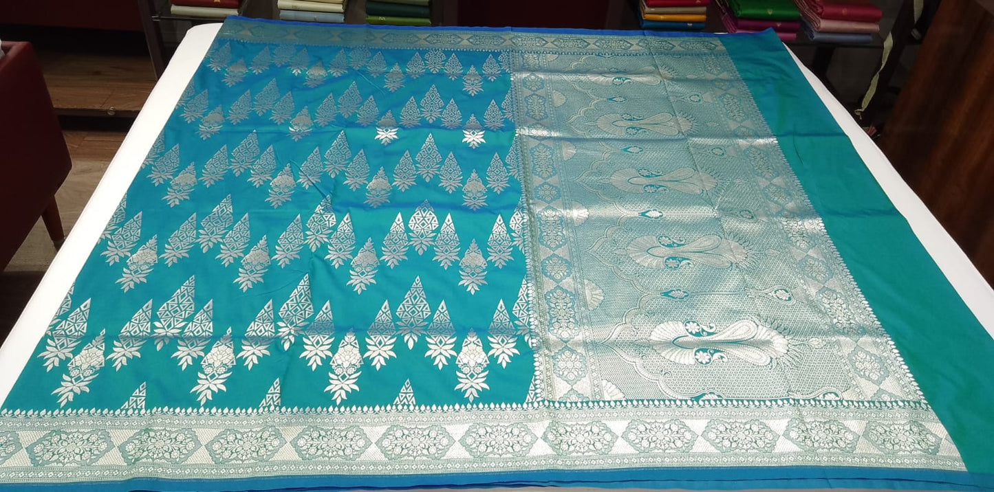 Teal Blue Banarasi Katan Semi Silk Saree with Silver Zari Floral & Paisley Weaves