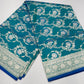 Turquoise Teal & Peacock Blue Dual-Shade Banarasi Silk Saree with Floral Zari Weaves