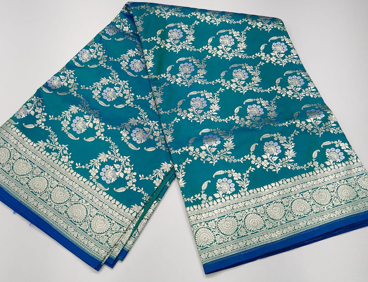 Turquoise Teal & Peacock Blue Dual-Shade Banarasi Silk Saree with Floral Zari Weaves