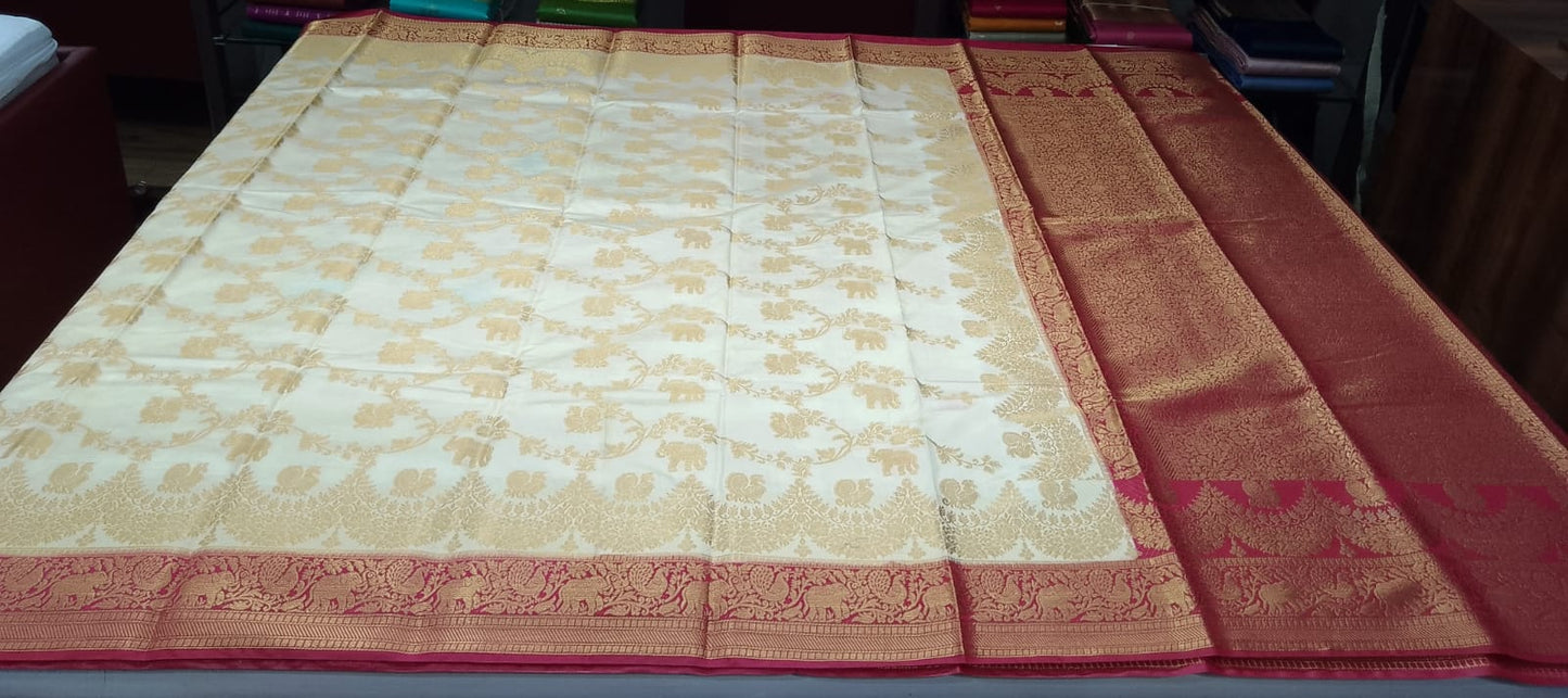 Ivory Cream Semi Silk Saree with Elephant Motifs & Rich Wine Zari Border