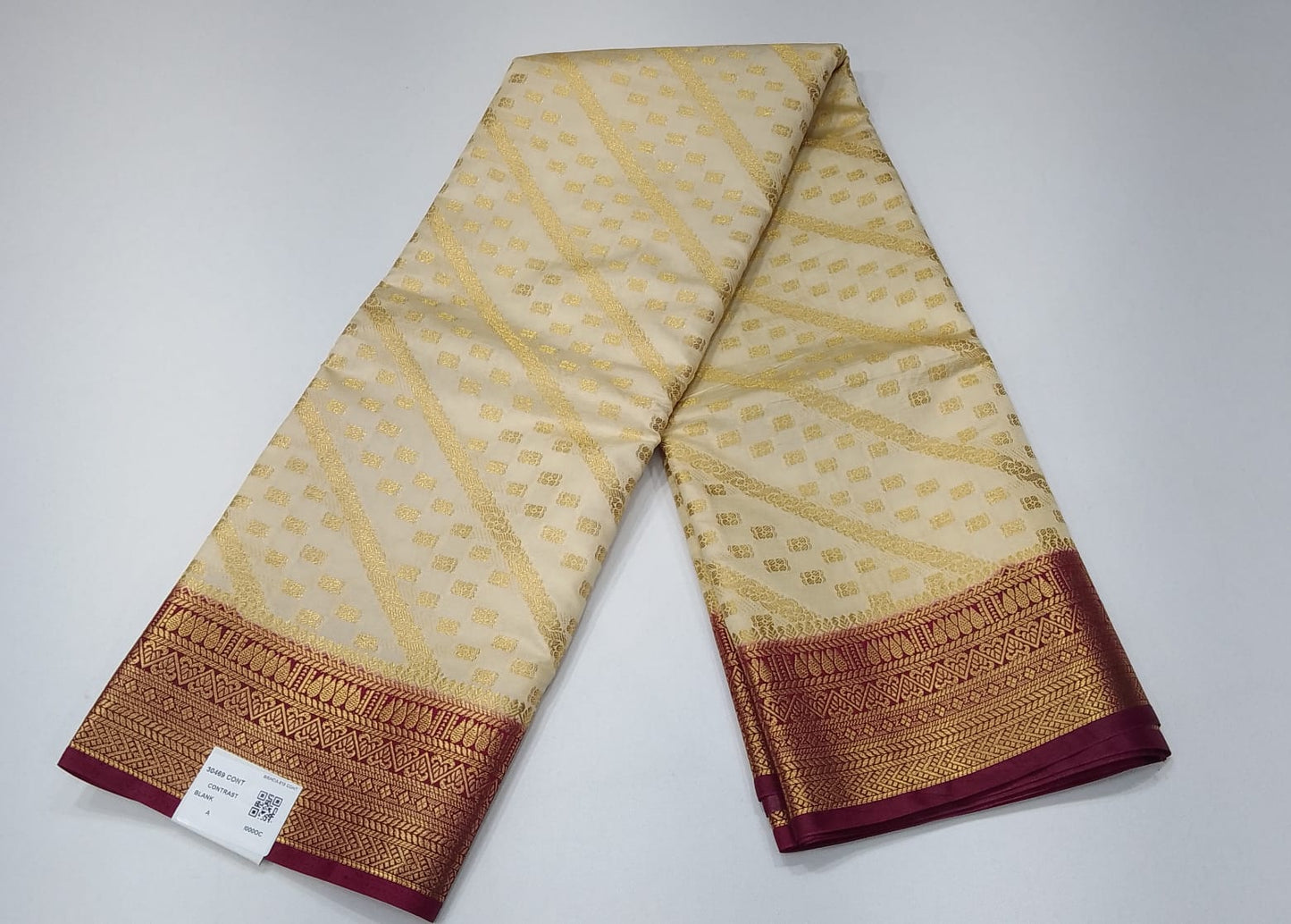 Ivory Cream Semi Silk Saree with Antique Gold Zari & Deep Magenta Border