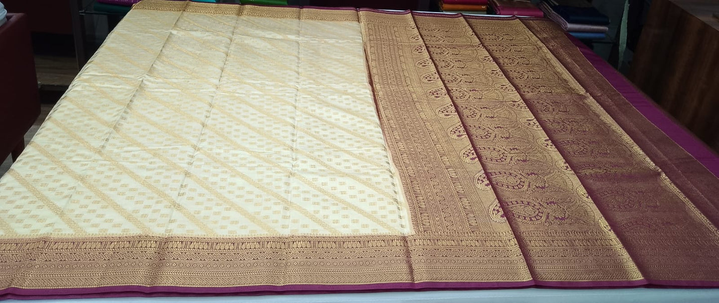 Ivory Cream Semi Silk Saree with Antique Gold Zari & Deep Magenta Border