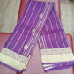 Elegant Purple Semi Soft Silk Saree with Gold Zari Stripes & Floral Border