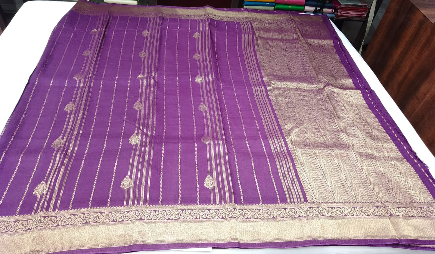 Elegant Purple Semi Soft Silk Saree with Gold Zari Stripes & Floral Border