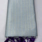 Powder Blue Linen Saree with Antique Gold Zari & Purple Blouse