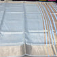 Powder Blue Linen Saree with Antique Gold Zari & Purple Blouse
